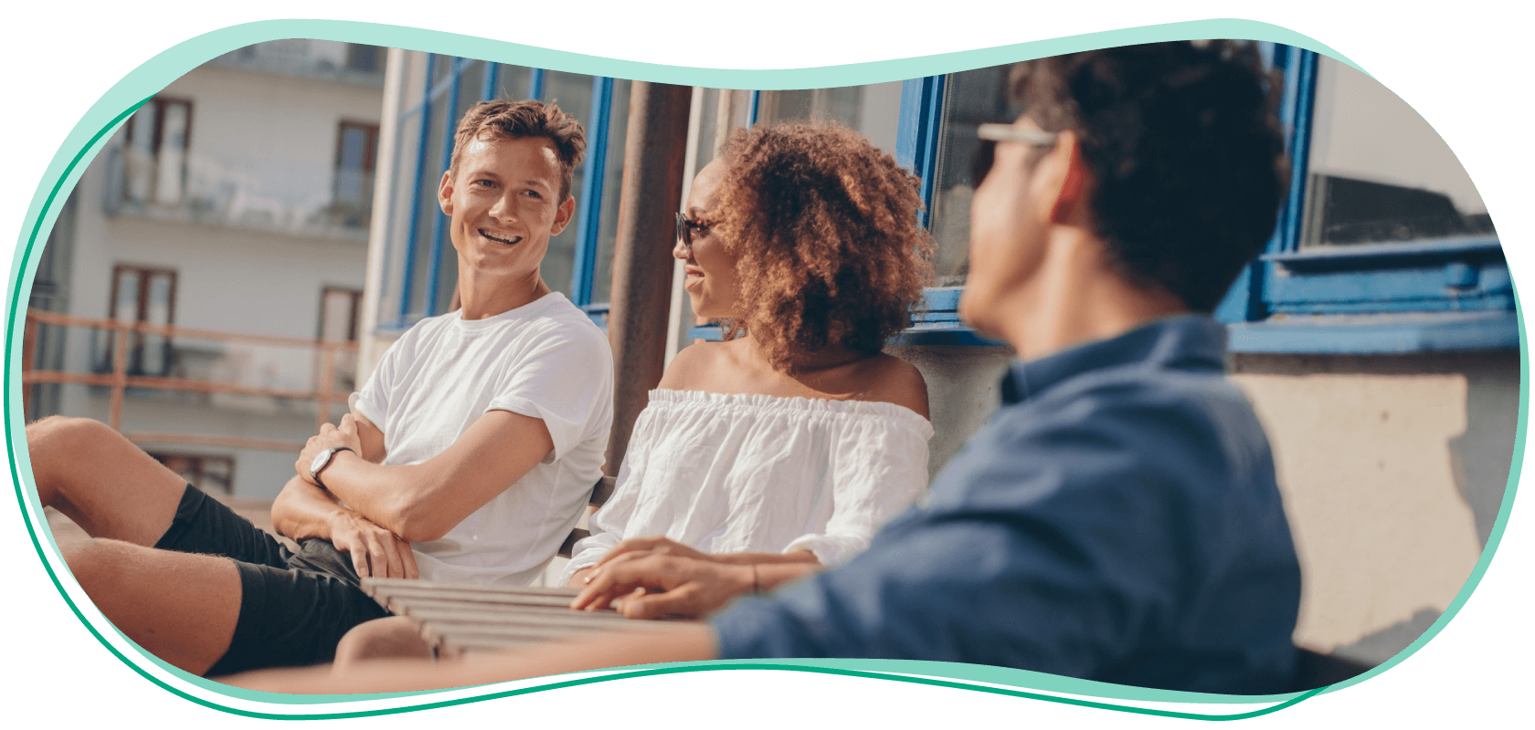 rgc-young-adult-risks-multiracial-group-of-young-people-relaxing-outdoors-at-cafe-table